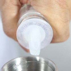 Dosificador Plástico Spill Stop Americano
